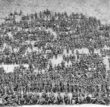 Australian 11th (Western Australia) Battalion, 3rd Infantry Brigade,  Australian Imperial Force posing on the Great Pyramid of Giza on 10 January  1915