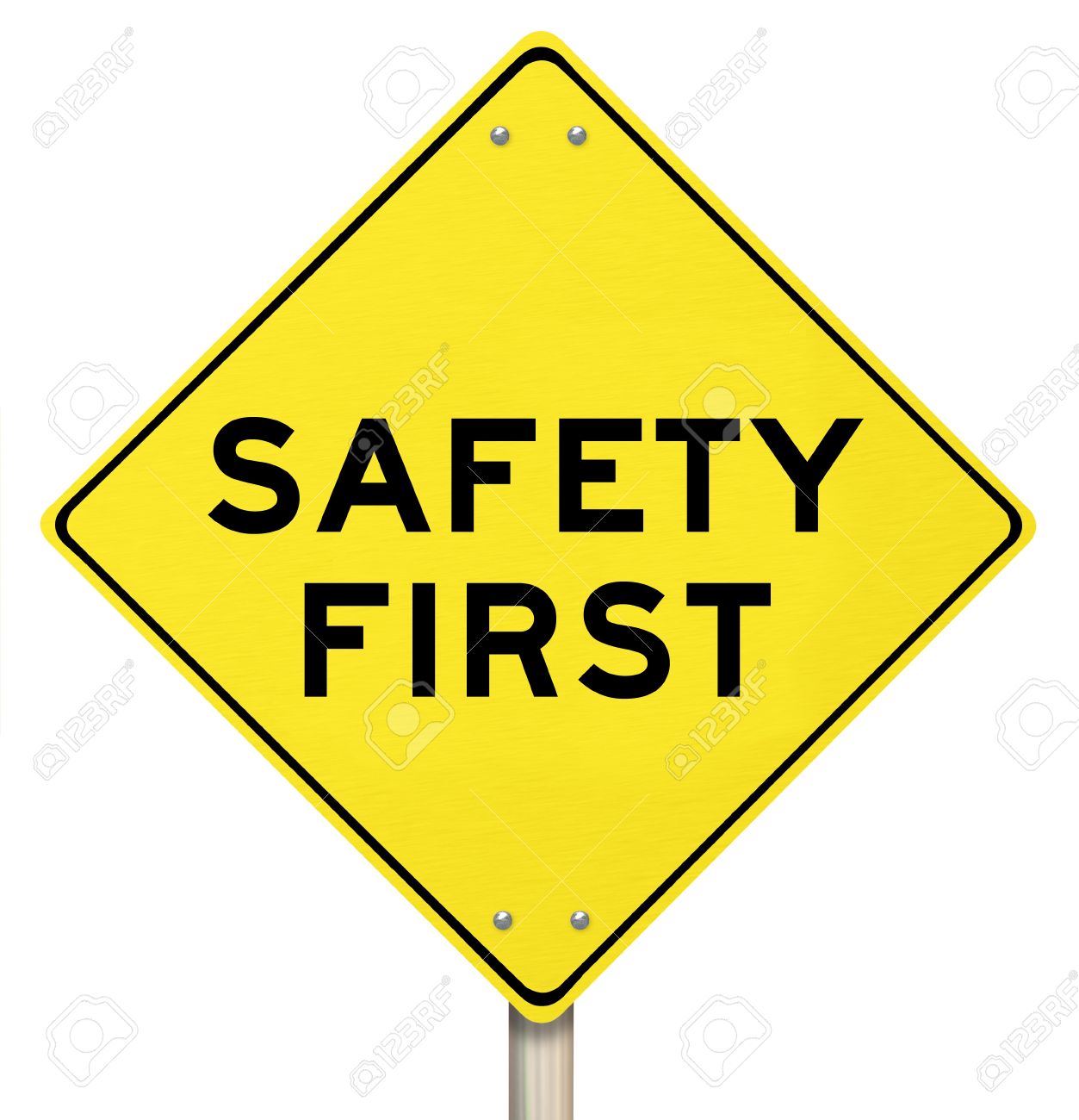 A yellow diamond-shaped road sign cautions Safety First Stock Photo -  17944291