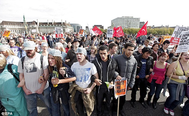 Road block: Hundreds of demonstrators blocked Westminster Bridge in a  protest against cuts to the