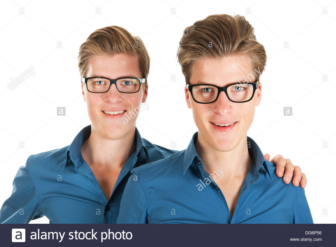 Identically adult male twins in studio