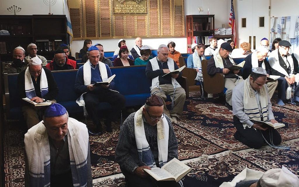 It is a custom among Karaite Jews to pray kneeling on the ground, as seen